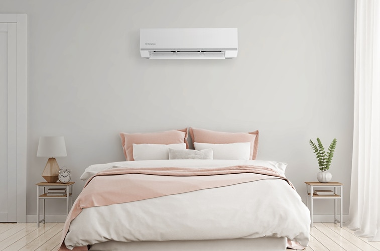 Split system reverse air conditioner in a bedroom or smaller living rooms